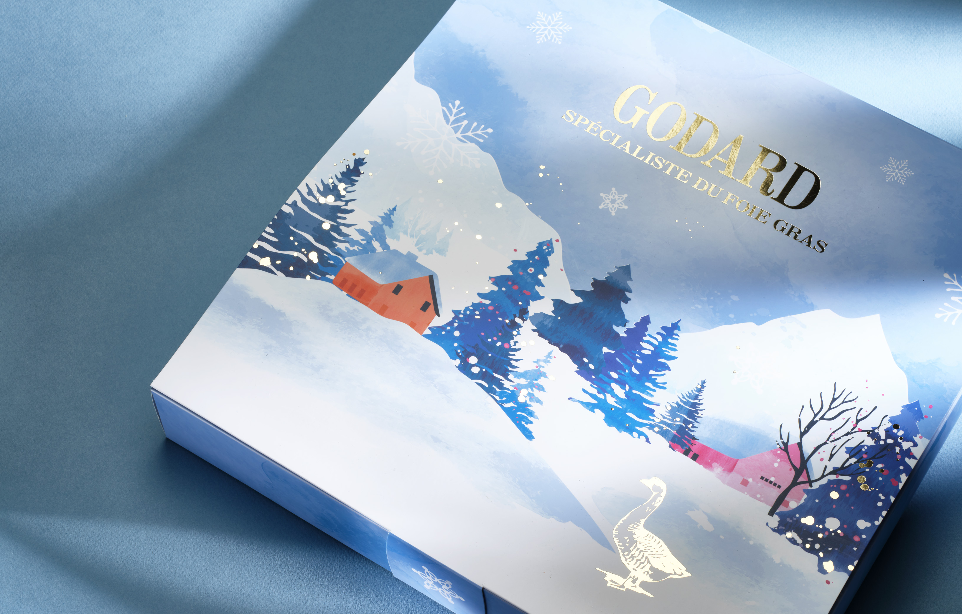 Calendrier de l'avent représentant un paysage de nature enneigée en aquarelle